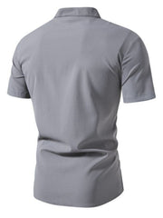 Men's grey short sleeve button-up shirt with band collar and textured cotton fabric.