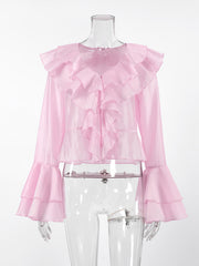 Pink ruffle trim long sleeve blouse with dramatic bell sleeves and ruffled neckline.