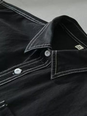 Black men's undershirt with contrast white stitching and buttons