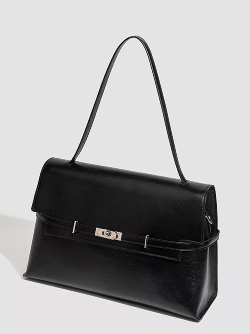 Black pu leather shoulder bag with silver buckle detail