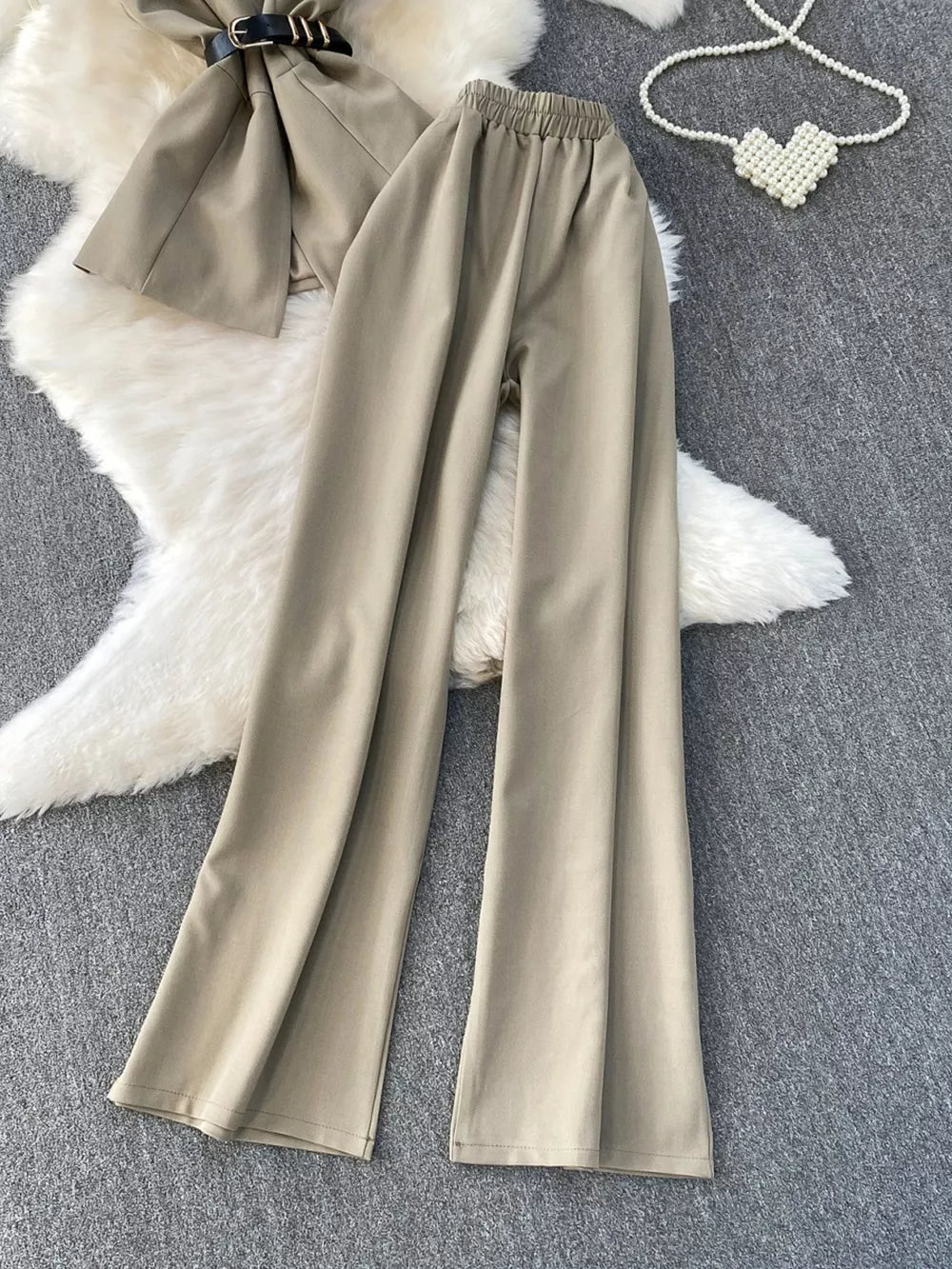 Mocha belted two-piece set with wide-leg pants and pockets.