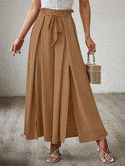 Caramel paperbag waist palazzo pants with side slits and tie detail.