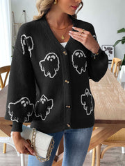 Black cardigan with white ghost motif, V-neck, balloon sleeves, and button front.