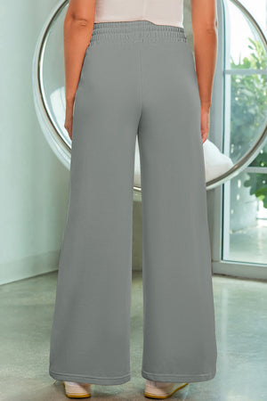 Heather gray palazzo joggers with center seam detail and elastic waistband.