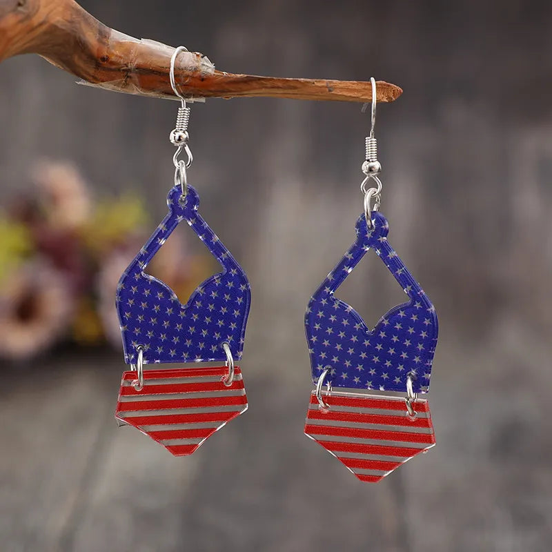 Patriotic bikini acrylic drop earrings with stars and stripes design.