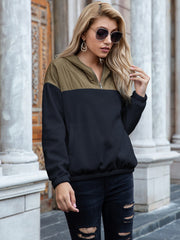 Quilted shoulder block fleece hoodie in dark blue and khaki with quarter zip and pockets.