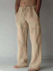 Tan linen blend wide-leg drawstring trousers with pockets