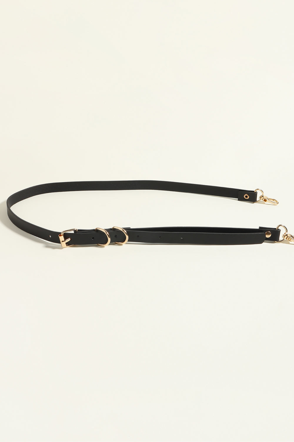 Black PU leather harness belt with gold chain detail and buckle
