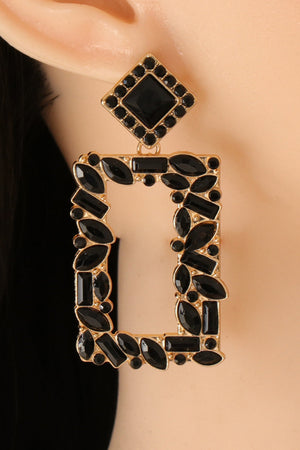 Black geometric jewel box earrings with gold alloy frame and faceted stones.