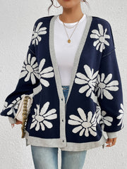 Dark navy acrylic floral jacquard knit cardigan with grey trim and buttons.