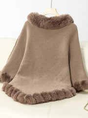 Camel knit poncho with faux fur trim at neckline and hem