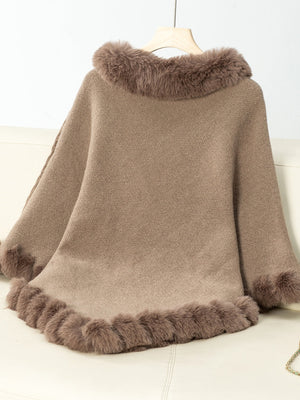 Camel knit poncho with faux fur trim at neckline and hem