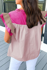 Colorblock ruffle yoke blouse in pink and tan with ruffled sleeves.