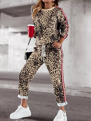 Leopard print loungewear set with red stripe detail on sleeves and pants.
