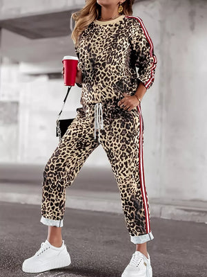 Leopard print loungewear set with red stripe detail on sleeves and pants.