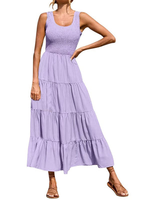 Smocked bodice ruffled maxi dress in lavender with tiered skirt.