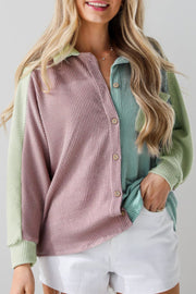Waffle knit colorblock button-up shirt in dusty pink and mint green with wooden buttons.