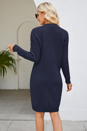 Cable knit bodycon mini dress in Peacock Blue with cable knit sleeves and textured body.
