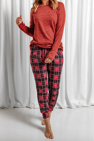 Cozy red plaid joggers with drawstring waist and matching long sleeve top.