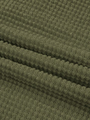 Moss waffle-knit polo shirt fabric detail