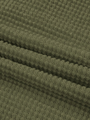 Moss waffle-knit polo shirt fabric detail