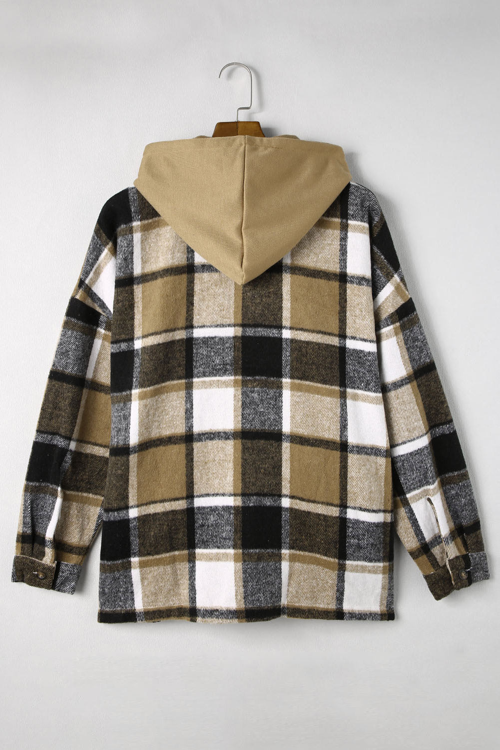 Plaid hooded shacket in tan, black, and white checkered pattern with a relaxed fit.