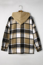 Plaid hooded shacket in tan, black, and white checkered pattern with a relaxed fit.