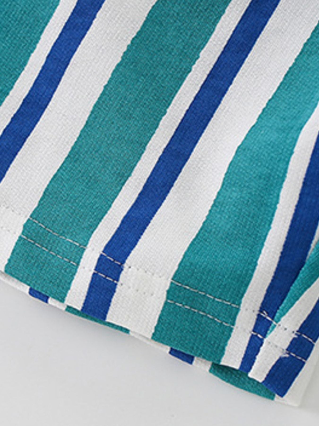 Boys' underwear with blue, teal, and white stripes, made of cotton.