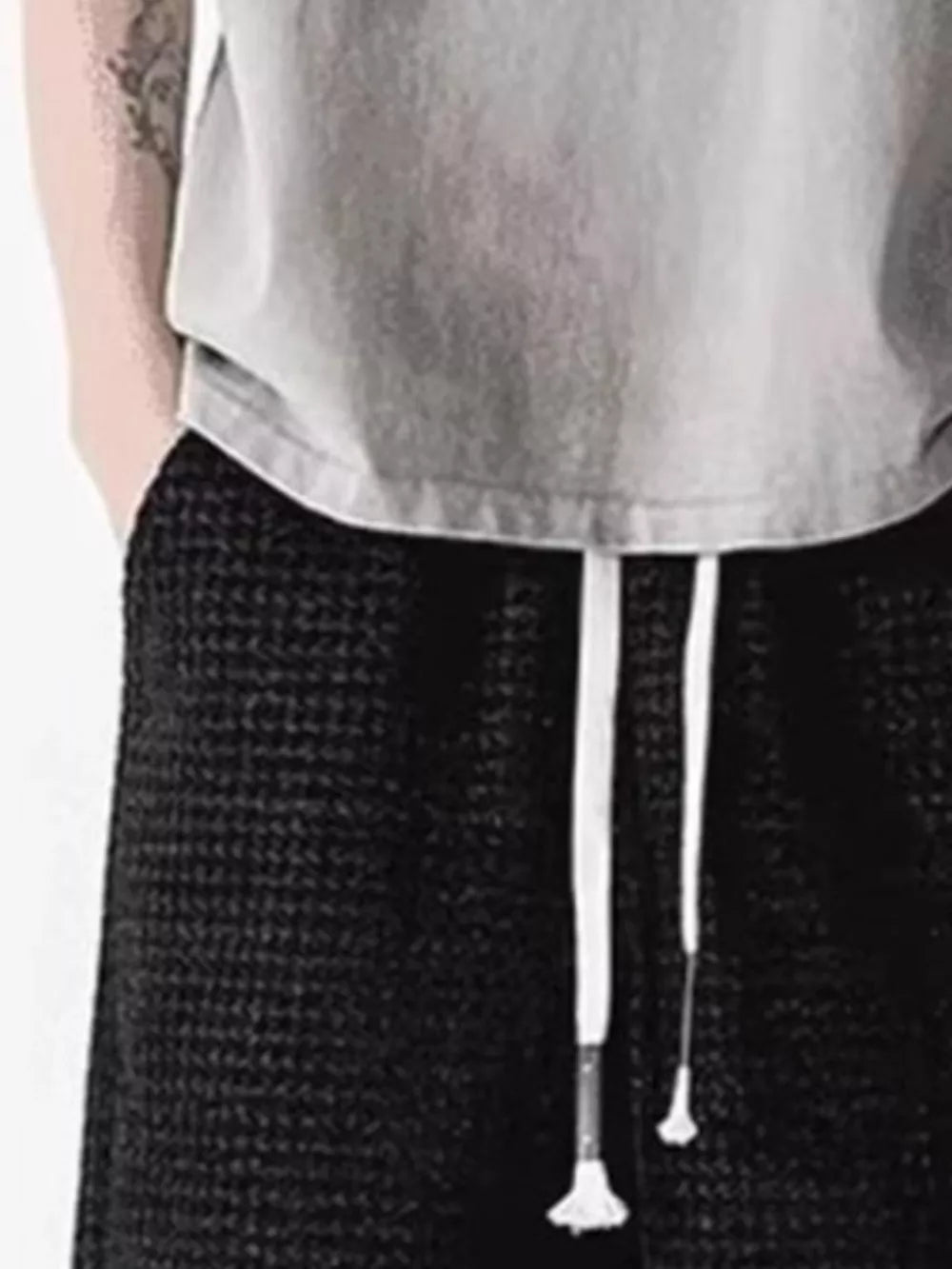 Men's black waffle-knit casual shorts with white drawstring