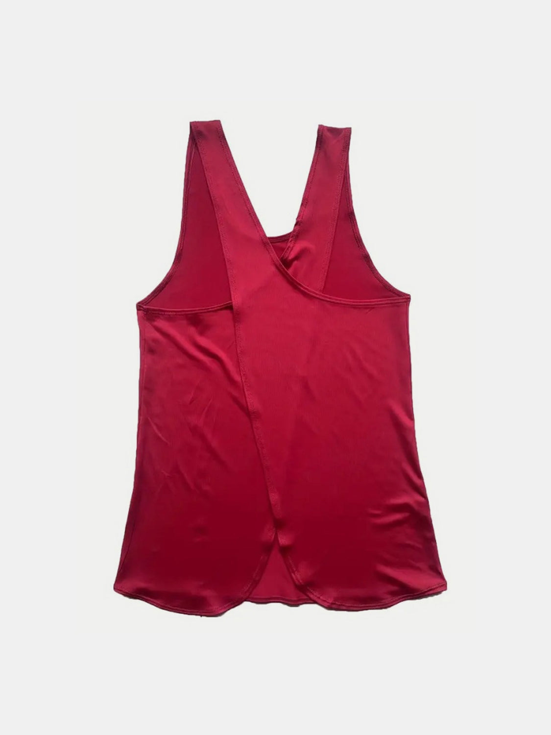 Deep Red flowy tank top with a cross-back detail and a satin-like sheen.