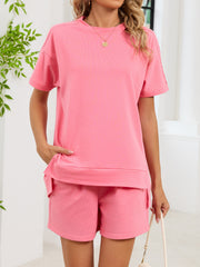 Pink relaxed two-piece set with crew neck tee and pocket shorts
