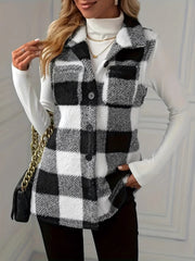 Textured black and white buffalo check buttoned vest jacket with collar.