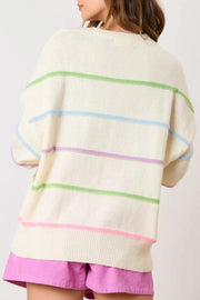 Ivory knit sweater with pastel stripes, crew neck, and relaxed fit.