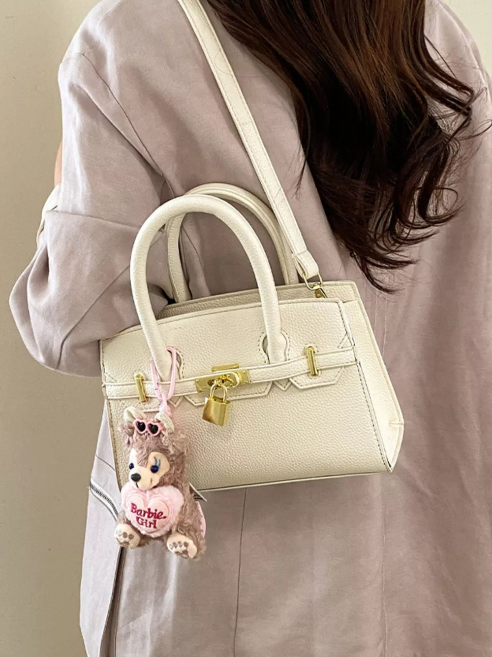 Lock Detail Top Handle Crossbody Bag in White, model styling view