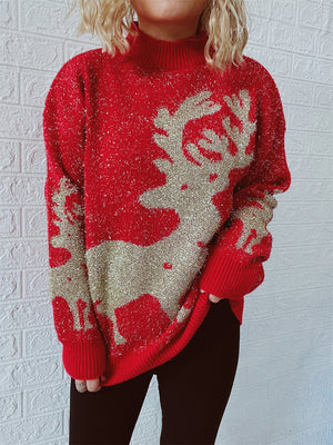 Red glitter knit sweater with gold reindeer graphic and mock neck.