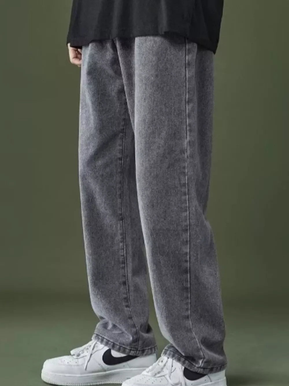 Men's grey washed wide-leg jeans with a casual fit.
