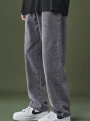 Men's grey washed wide-leg jeans with a casual fit.