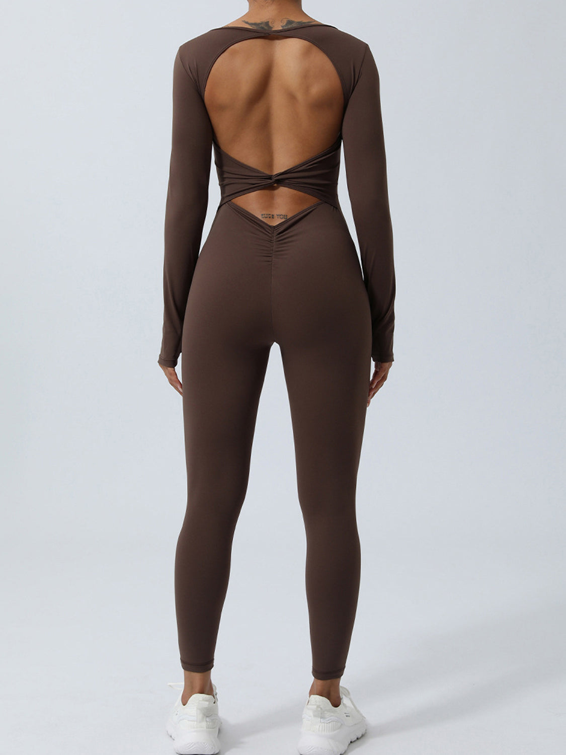 Chocolate long sleeve sculpting jumpsuit with open back detail and ruched bum.