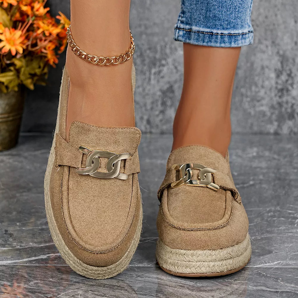 Chic brown round toe platform loafers with gold chain detail and espadrille sole.
