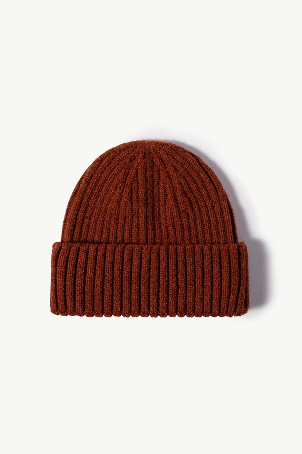 Brown chunky ribbed knit acrylic beanie with folded cuff.
