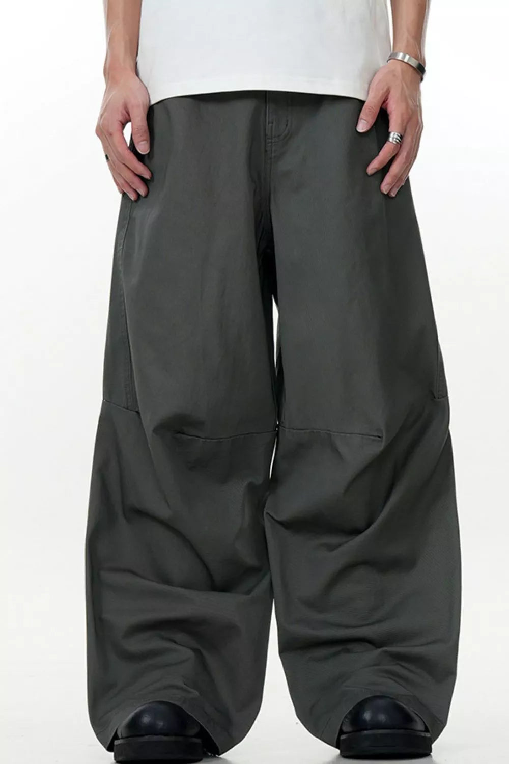 Men's wide leg cargo pants in dark gray, featuring a relaxed fit and casual styling.