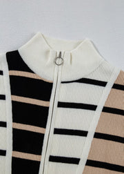 Colorblock ribbed zip polo with black, white, and beige stripes and a silver zipper detail.