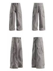 Light gray relaxed fit drawstring cargo pants with multiple pockets.