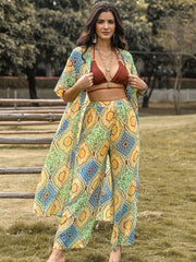 Bohemian print duster and palazzo set in Gum Leaf with a colorful geometric pattern.