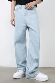 Baggy light blue denim palazzo jeans with button fly and wide leg.
