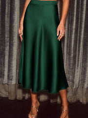 Dark green satin midi skirt with a flowing A-line cut.