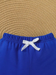 Blue baby shorts with elastic waistband and white drawstring bow detail.