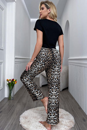 Leopard print wide leg lounge pants with a black crop tee.
