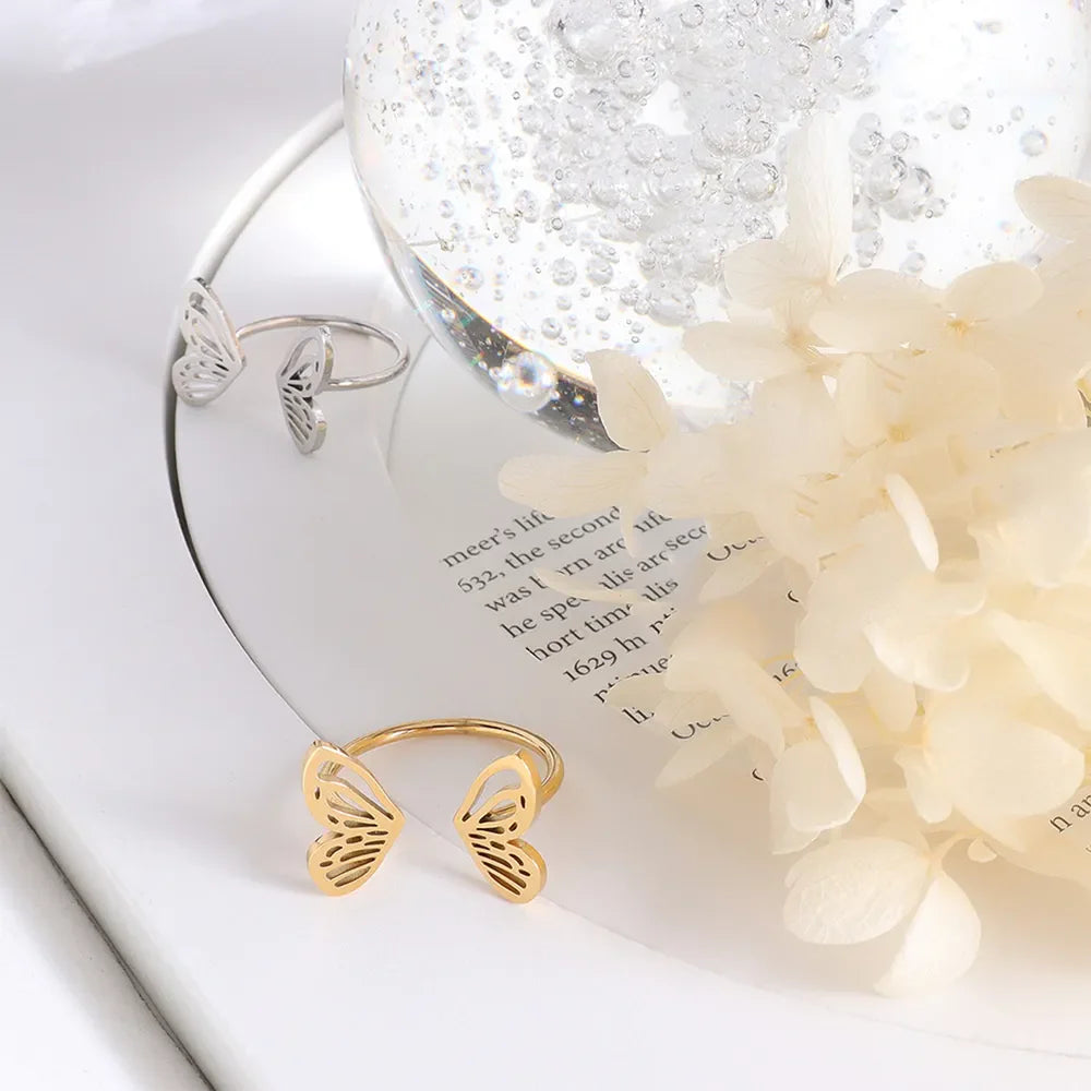Gold and silver butterfly wing open-ended rings