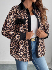 Leopard corduroy utility shirt jacket with black accents and button front.